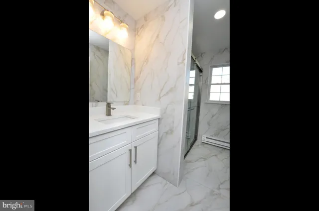 a view of a kitchen with washer and dryer