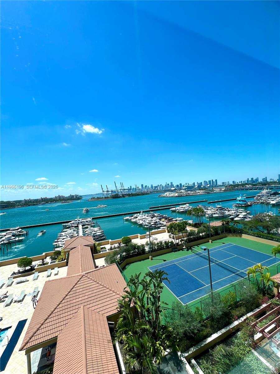 90 Alton Road, Unit 1106 Miami Beach, FL 33139 - Photo 12 of 21 a view of a swimming pool and outside space