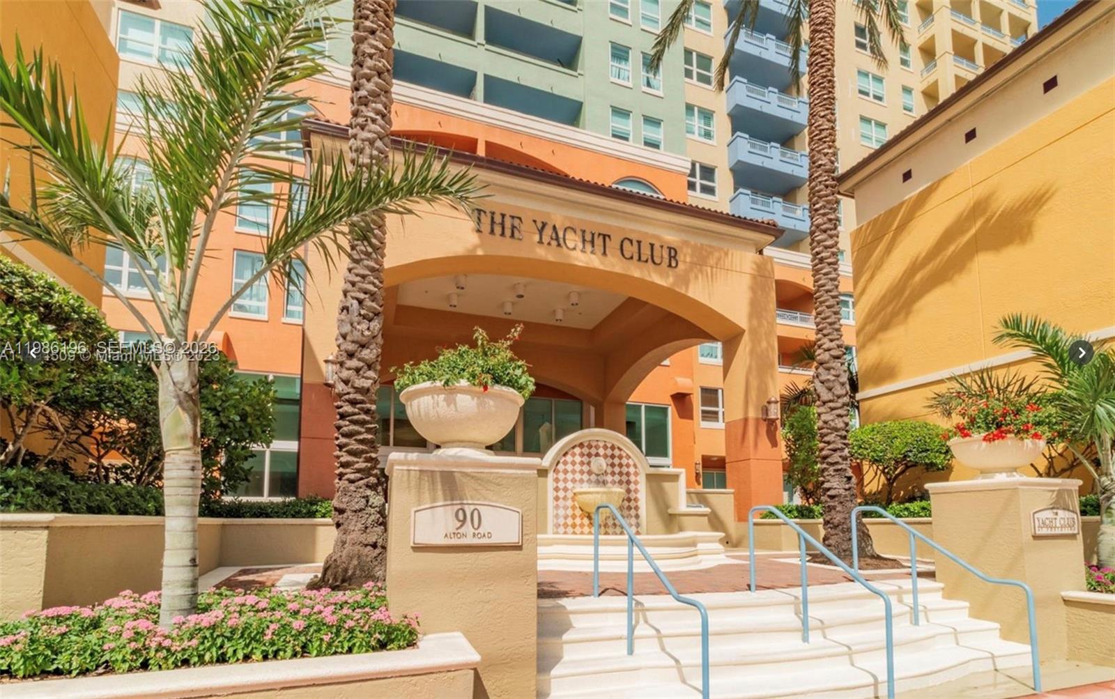 90 Alton Road, Unit 1106 Miami Beach, FL 33139 - Photo 14 of 21 front view of a building with a street