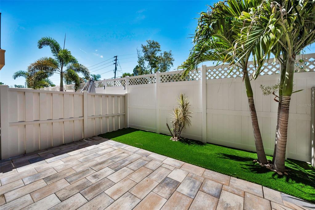 5032 Sand Castle Drive New Port Richey, FL 34652 - Photo 12 of 87 a view of a backyard