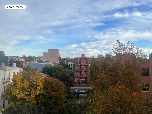 a view of a city with tall buildings