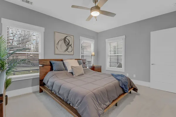 a work room with furniture and window