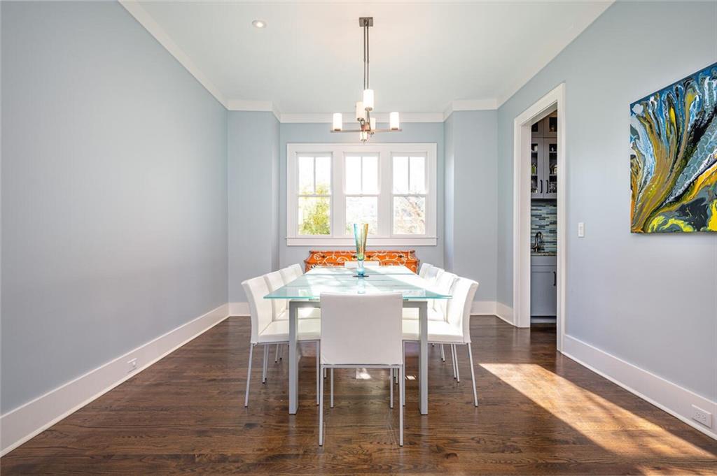 123 Ansley Street Decatur, GA 30030 - Photo 12 of 61 a view of a dining room with furniture window and wooden floor