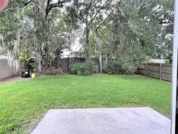 a view of a backyard with a garden