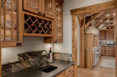a kitchen with a stove and a refrigerator