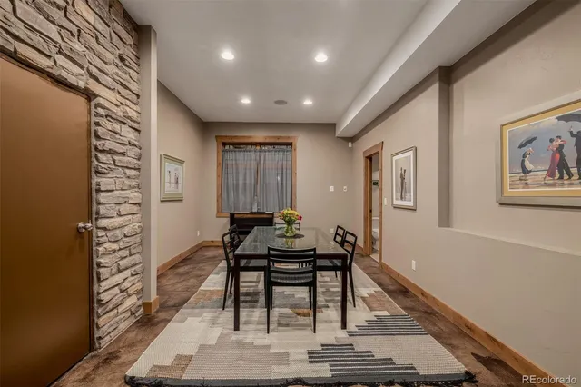 a workspace with furniture and rug