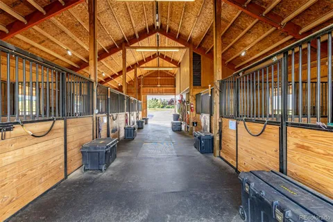 a view of a porch with wooden floor
