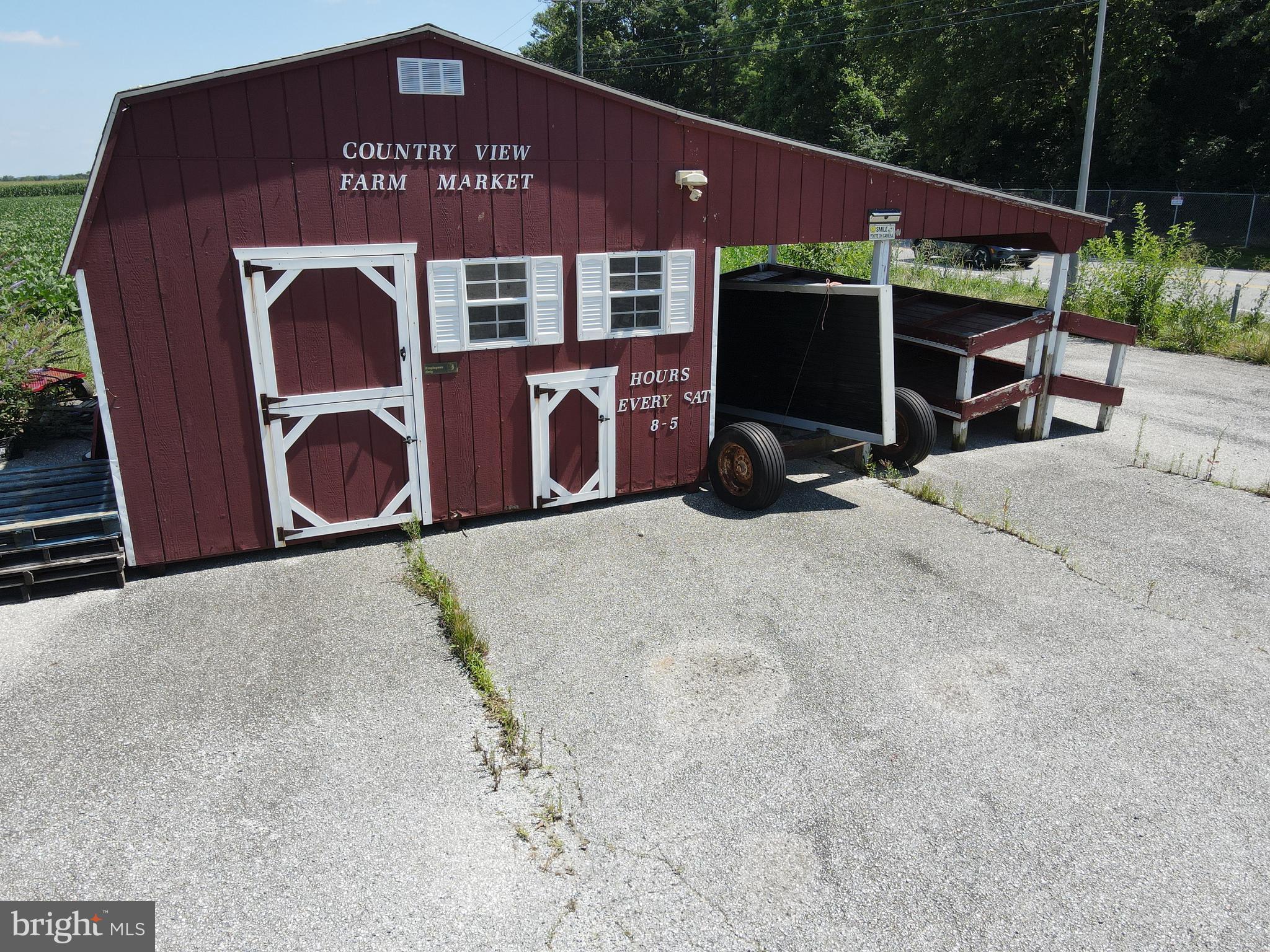 0 Lancaster Road Manheim, PA 17545 - Photo 9 of 27 a front view of a multi story building with yard