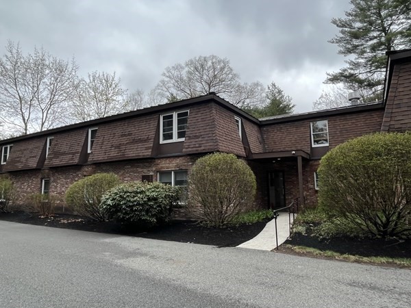 15 Lawrence Road, Unit 20 Rowley, MA 01969 - Photo 1 of 22 a front view of a house with garden