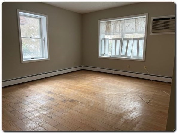 15 Lawrence Road, Unit 20 Rowley, MA 01969 - Photo 11 of 22 an empty room with windows