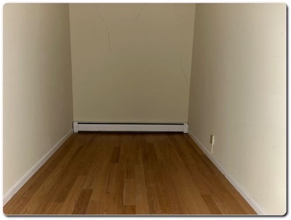 15 Lawrence Road, Unit 20 Rowley, MA 01969 - Photo 17 of 22 a view of a room with wooden floor
