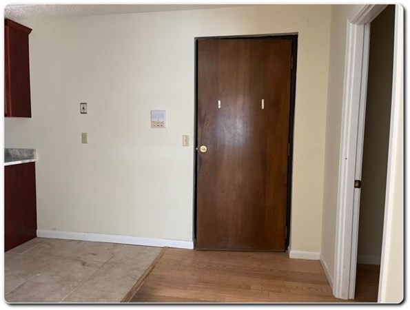 15 Lawrence Road, Unit 20 Rowley, MA 01969 - Photo 5 of 22 a view of an entryway door