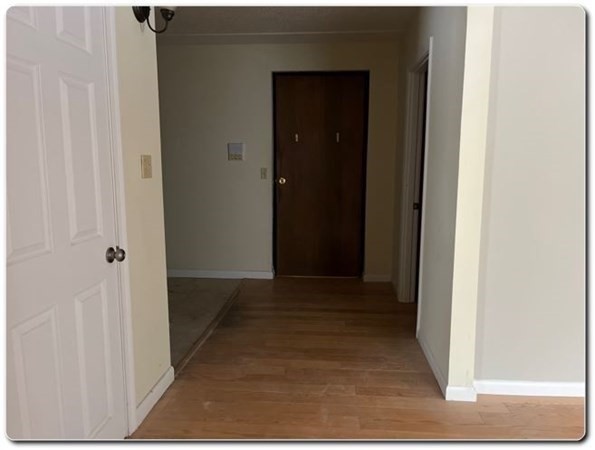 15 Lawrence Road, Unit 20 Rowley, MA 01969 - Photo 6 of 22 a view of hallway with closet
