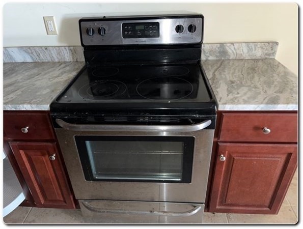 15 Lawrence Road, Unit 20 Rowley, MA 01969 - Photo 9 of 22 a stove top oven sitting inside of a kitchen