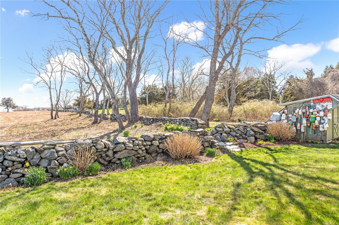 7 Clarkes Village Road Jamestown, RI 02835 - Photo 41 of 50 Beautiful stone walls and outdoor shed