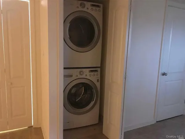 a view of hallway with a bathroom