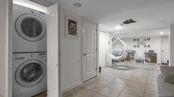 a bathroom with a sink toilet and mirror