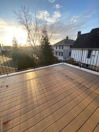 a kitchen with stainless steel appliances granite countertop a stove a refrigerator and a sink