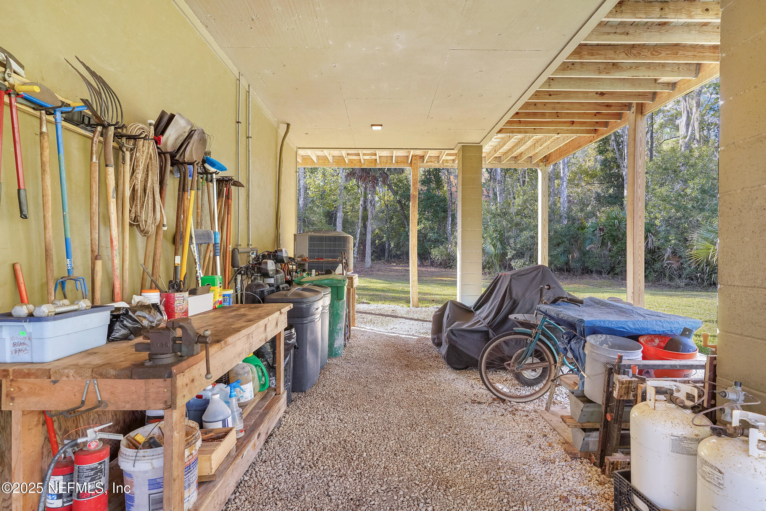 122 Drayton Island Road Georgetown, FL 32139 - Photo 12 of 59 a room with furniture and a large window