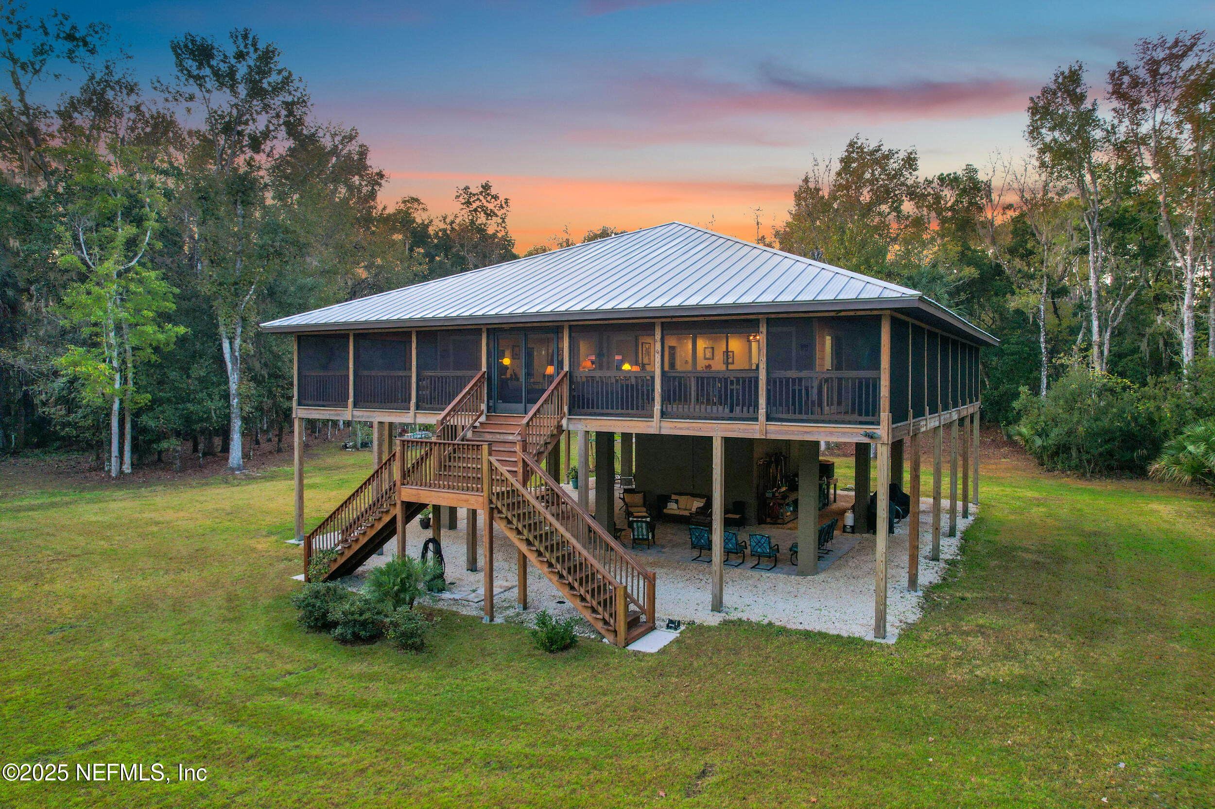 122 Drayton Island Road Georgetown, FL 32139 - Photo 2 of 59 a view of a house with a yard