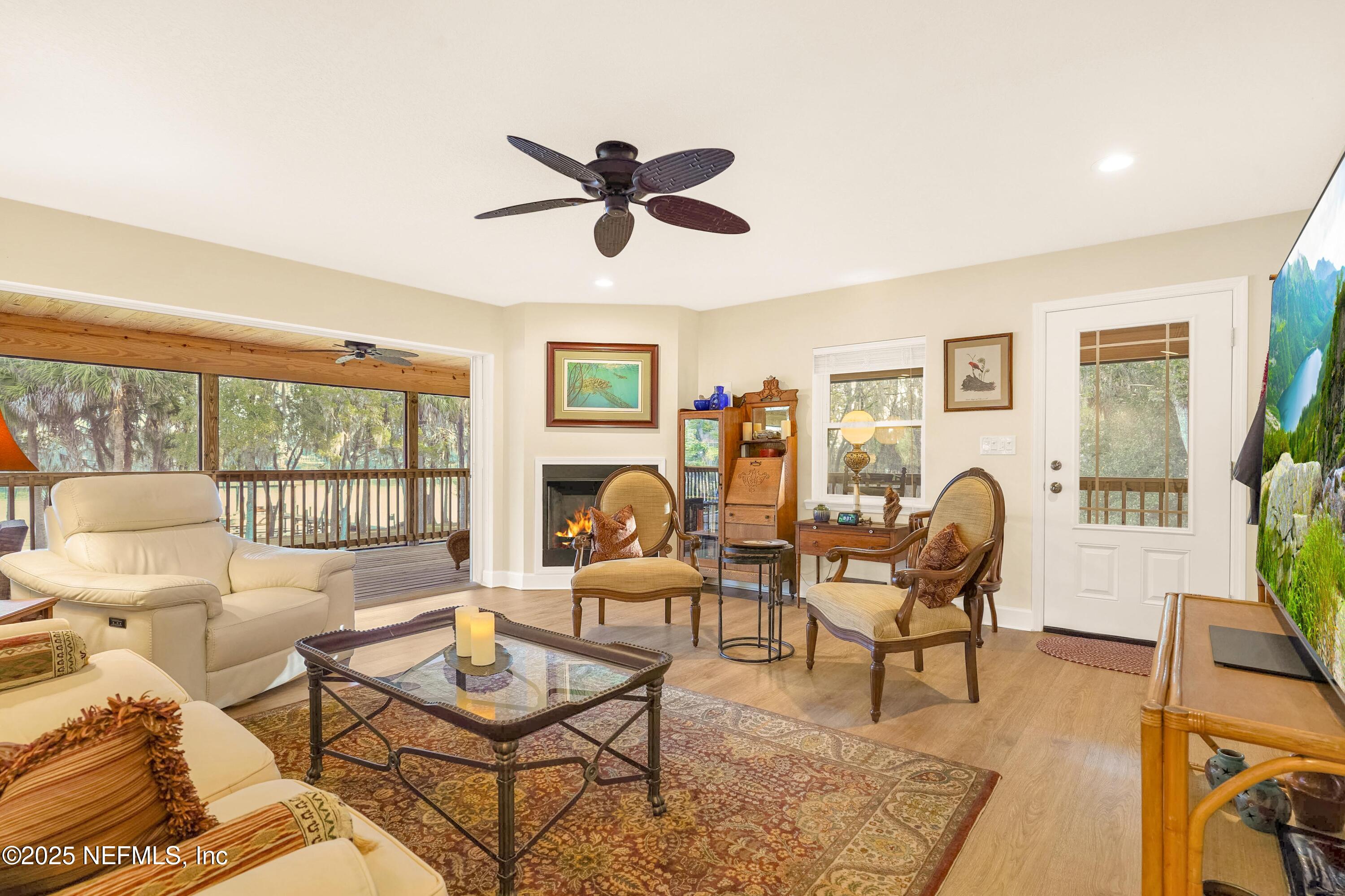 122 Drayton Island Road Georgetown, FL 32139 - Photo 23 of 58 a living room with furniture and a window