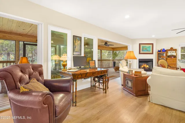 a bathroom with a sink mirror and toilet