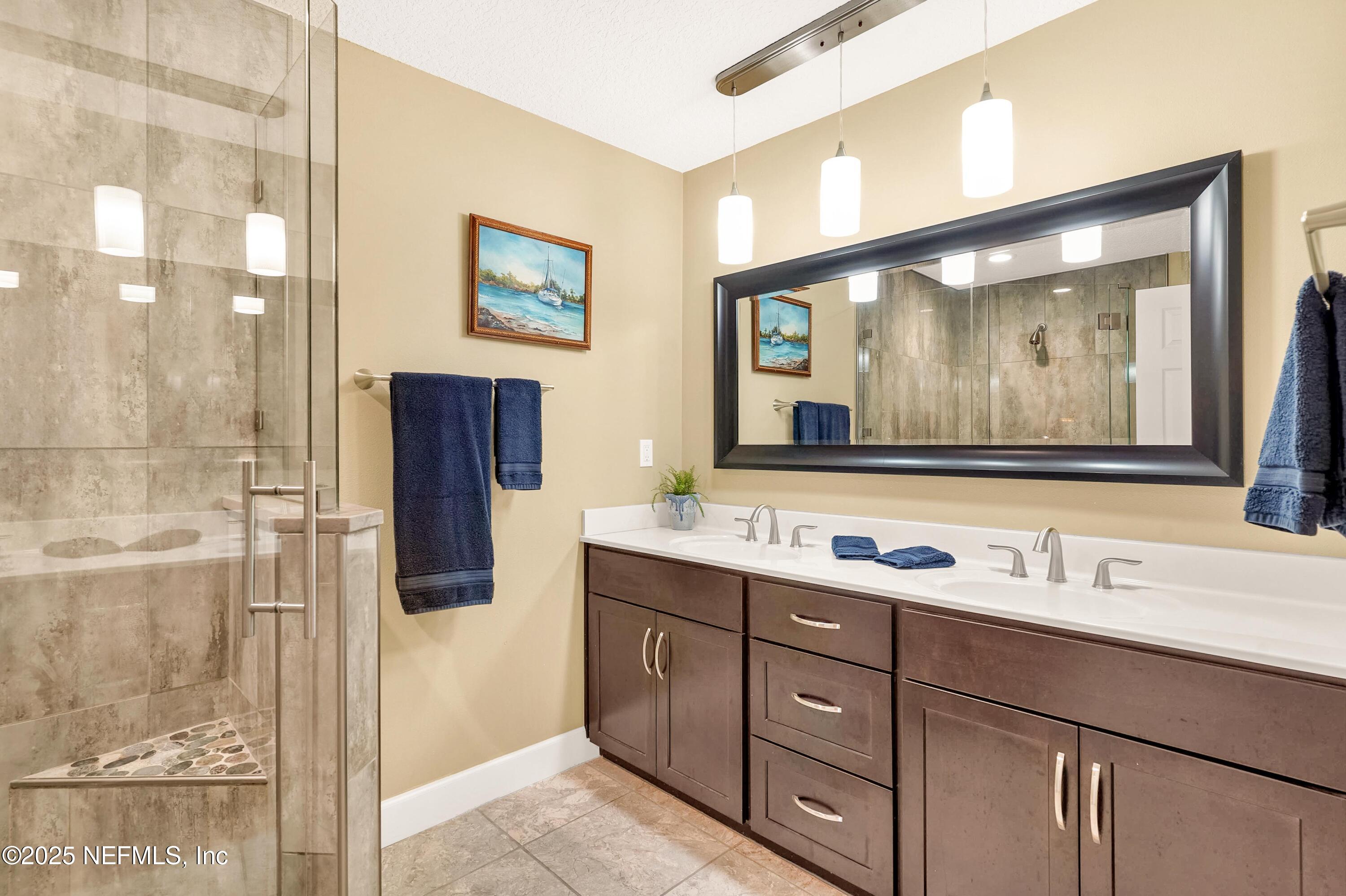 122 Drayton Island Road Georgetown, FL 32139 - Photo 35 of 58 a bathroom with a sink vanity and a mirror