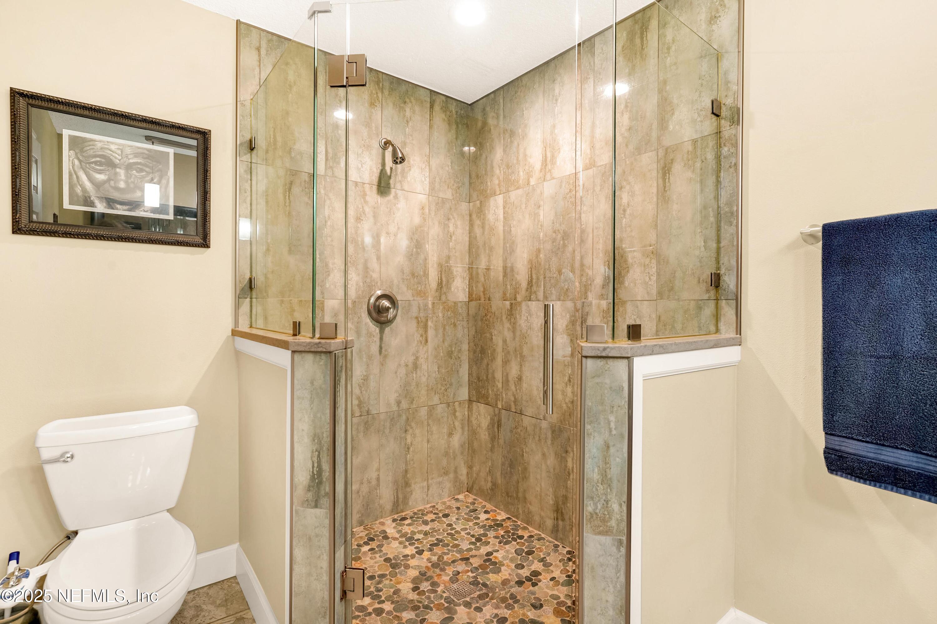 122 Drayton Island Road Georgetown, FL 32139 - Photo 36 of 58 a bathroom with a toilet sink and shower