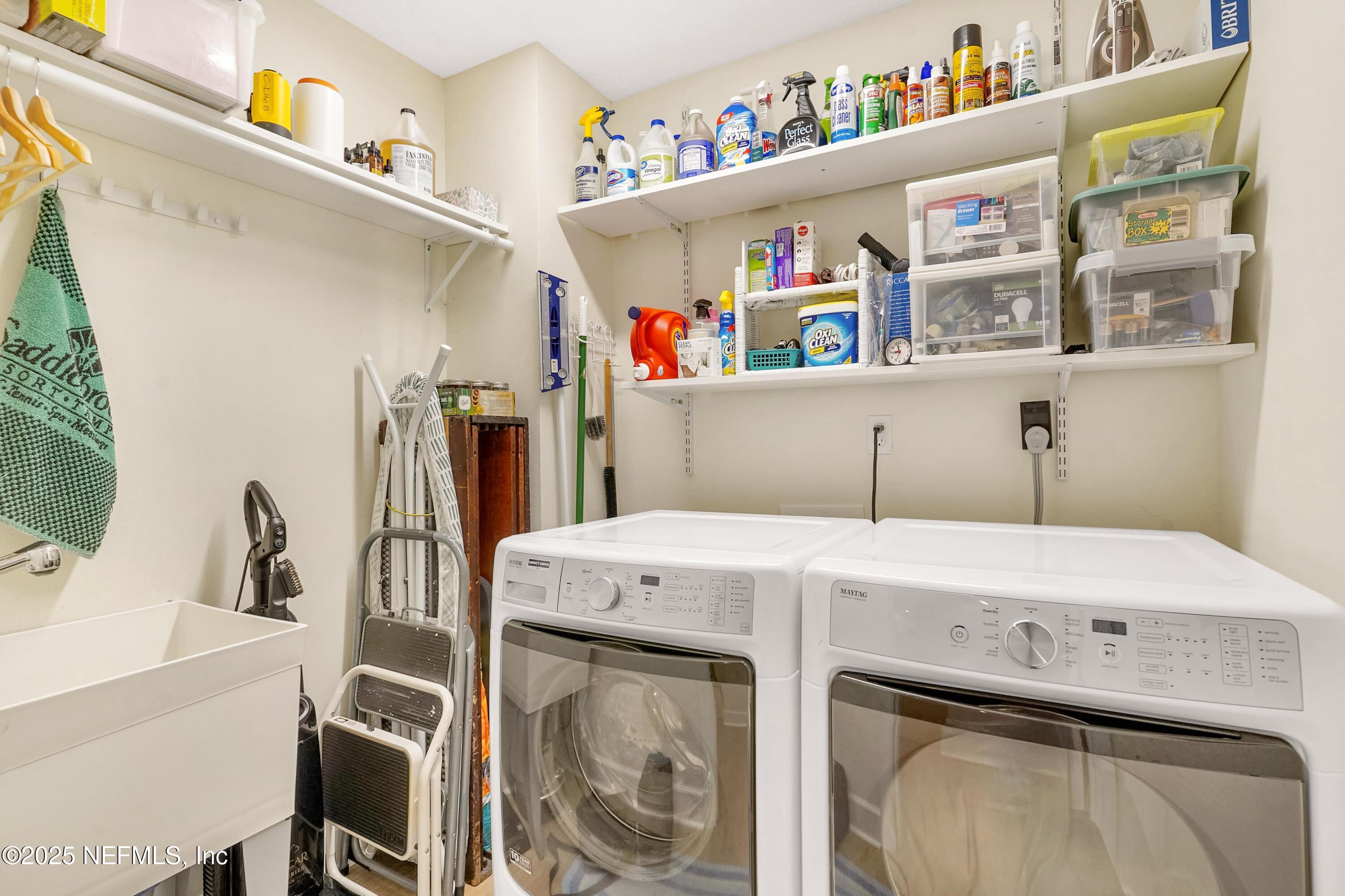 122 Drayton Island Road Georgetown, FL 32139 - Photo 41 of 58 a utility room with dryer and washer