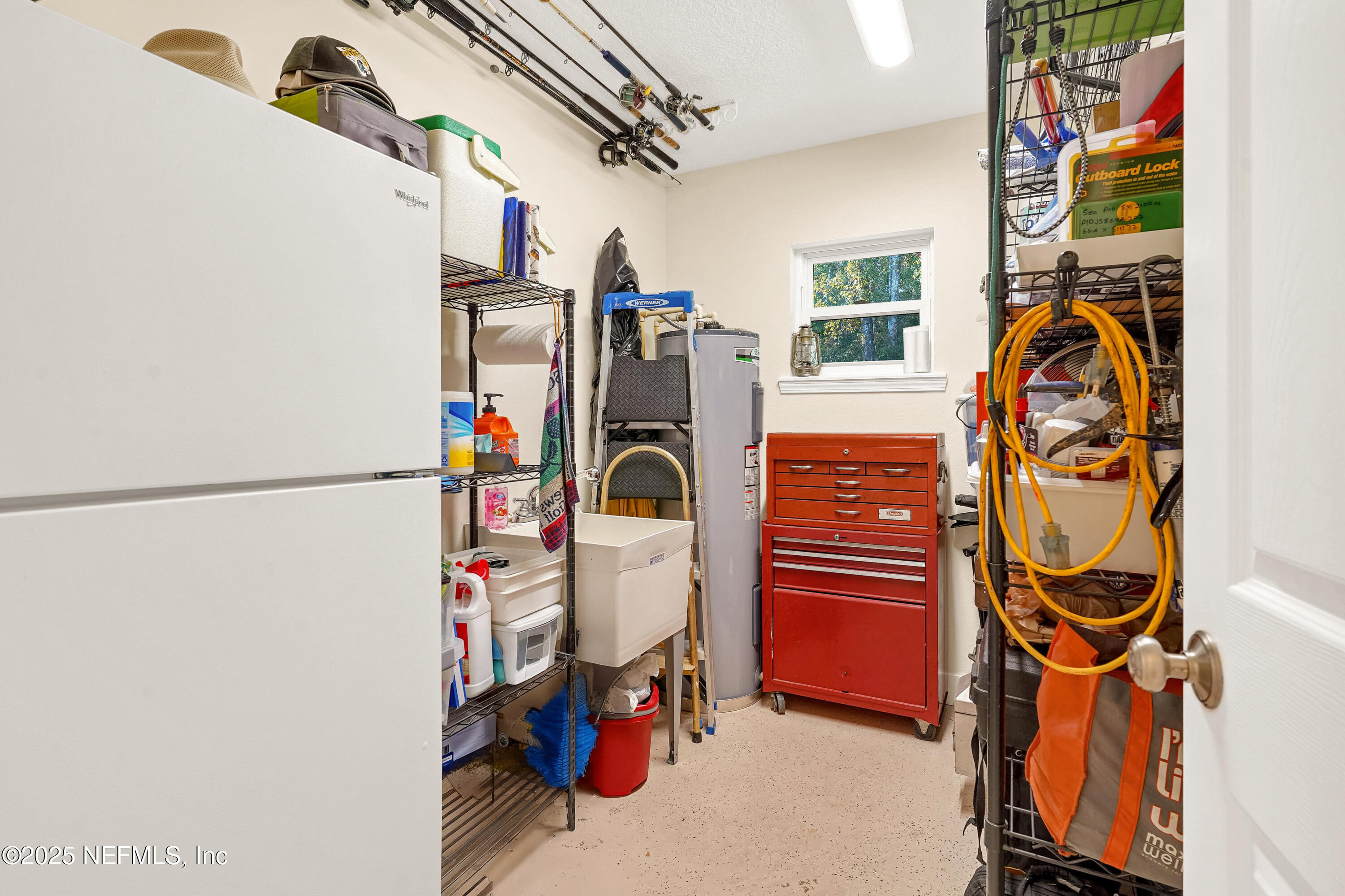 122 Drayton Island Road Georgetown, FL 32139 - Photo 45 of 58 a view of walk in closet with clothes and shoes