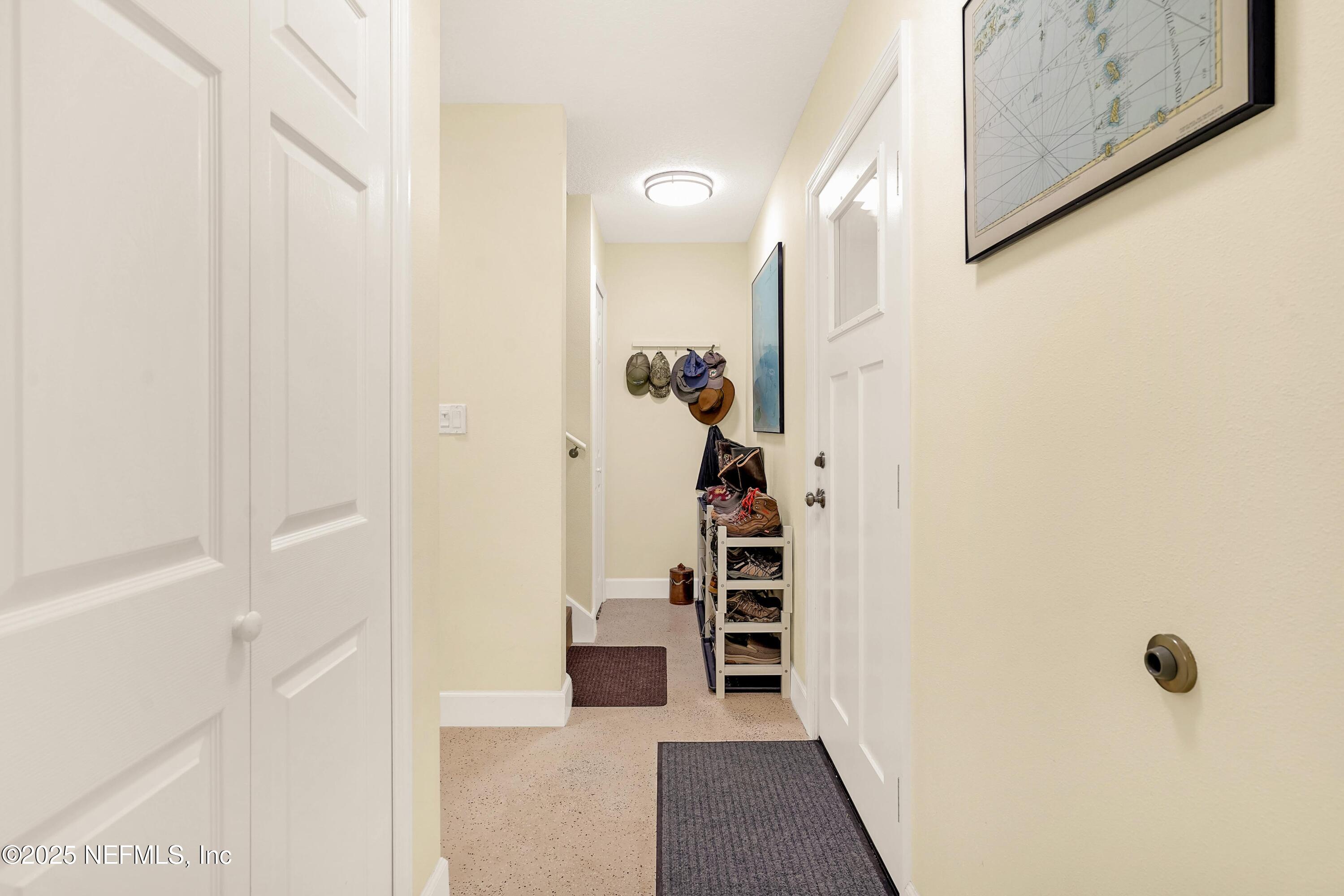 122 Drayton Island Road Georgetown, FL 32139 - Photo 45 of 59 a view of a hallway with wooden floor and stairs