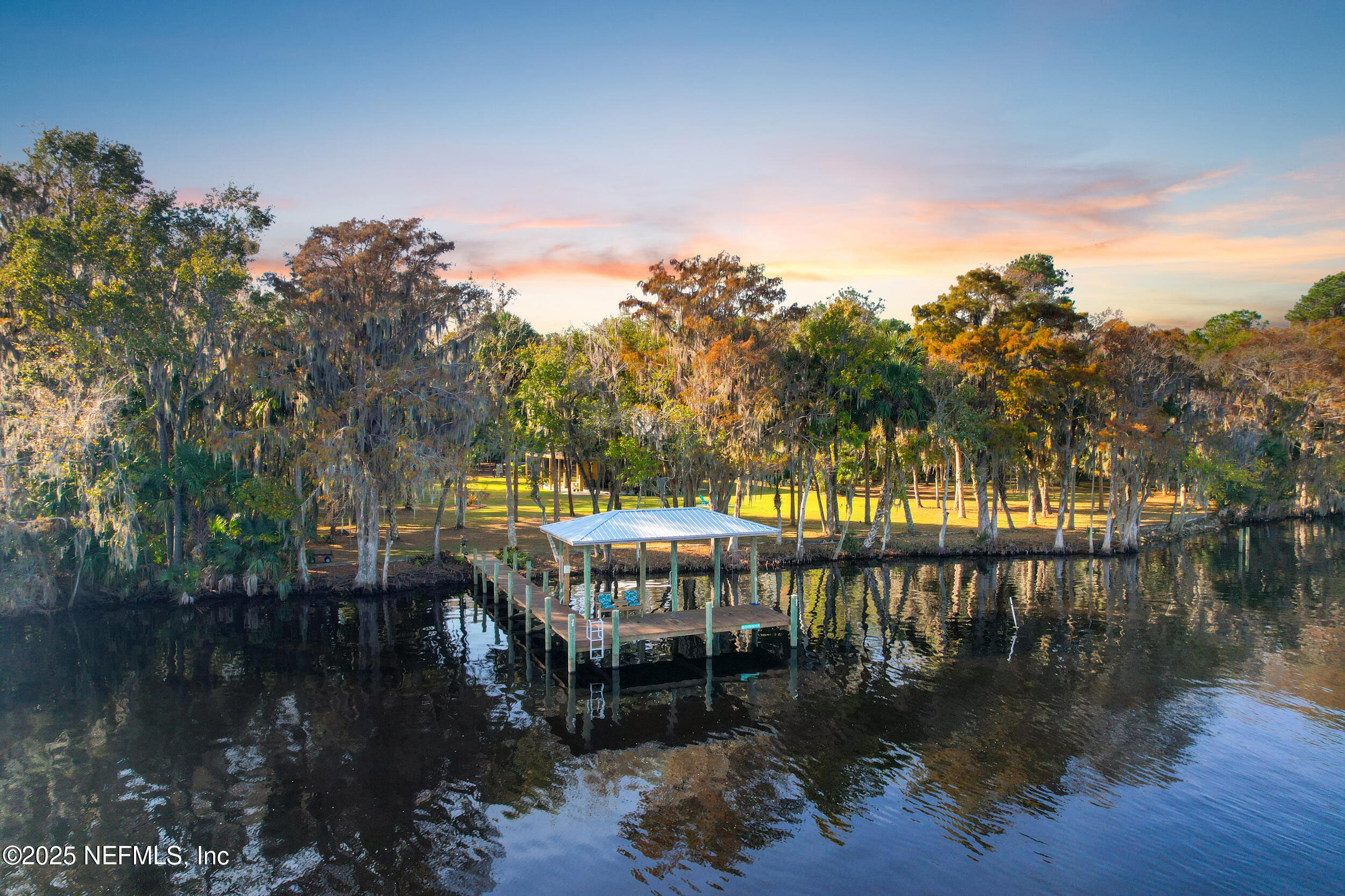 122 Drayton Island Road Georgetown, FL 32139 - Photo 49 of 59 a view of a lake with a mountain view