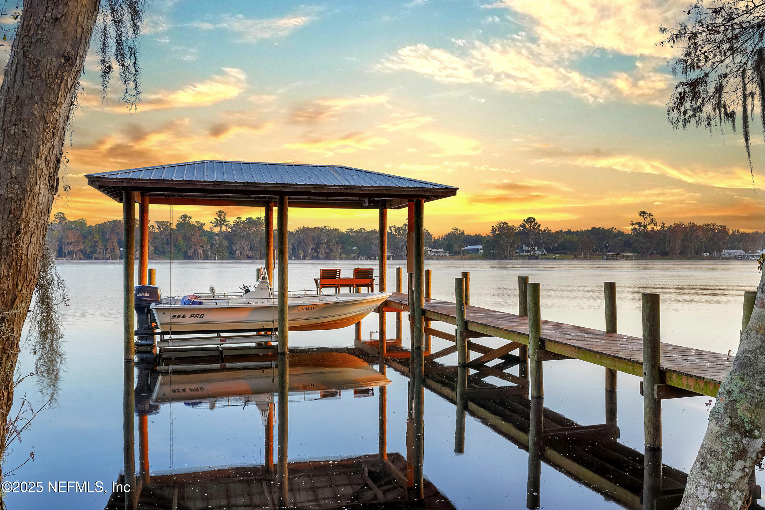 122 Drayton Island Road Georgetown, FL 32139 - Photo 50 of 59 a view of a chairs and table in the balcony