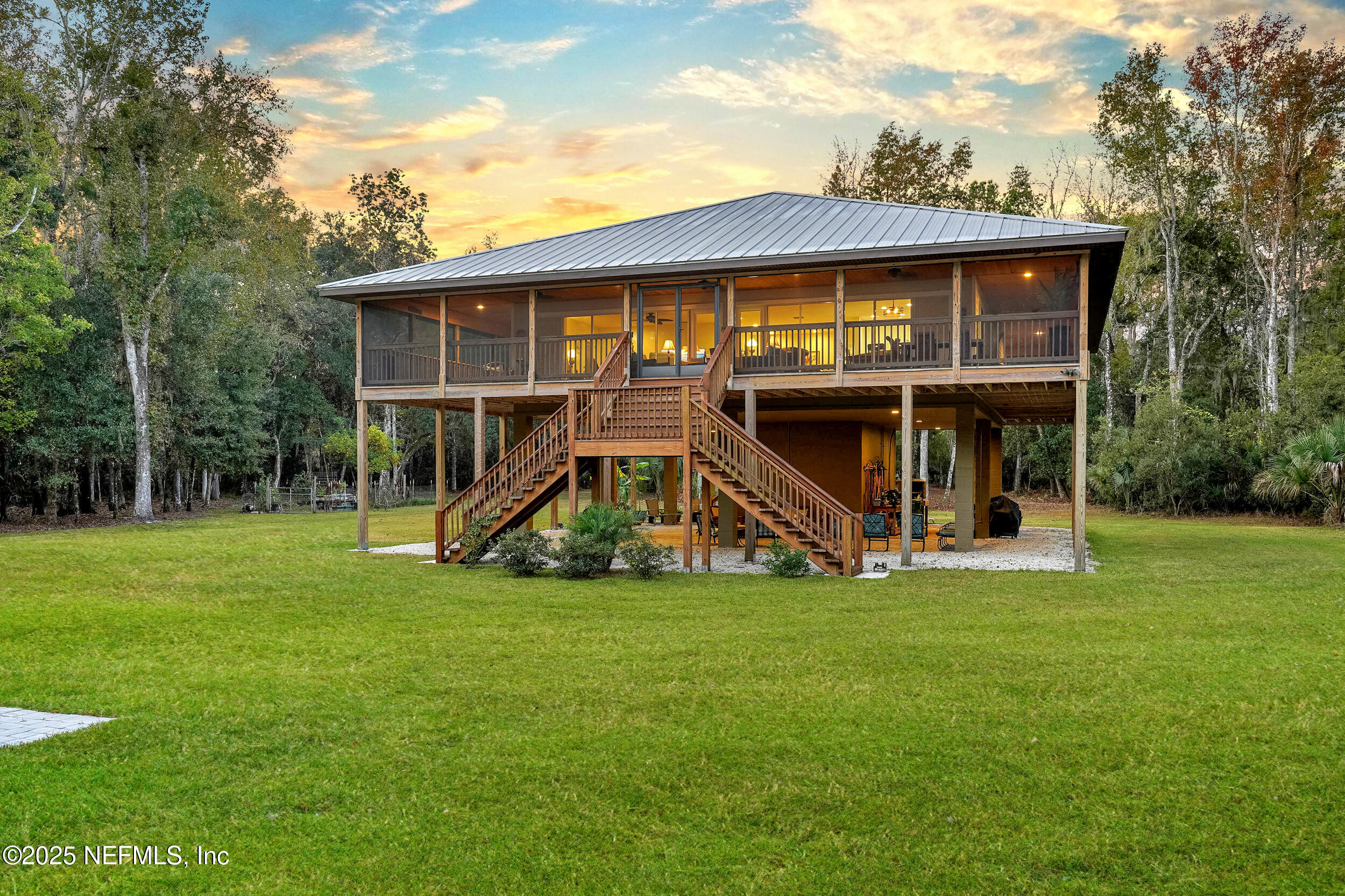 122 Drayton Island Road Georgetown, FL 32139 - Photo 5 of 59 a view of a house with backyard