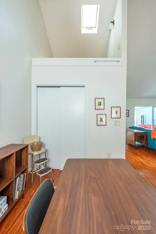 a room with furniture and a wooden floor