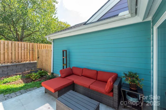 a backyard of a house with seating space