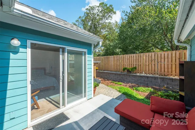 a view of a backyard with a tub