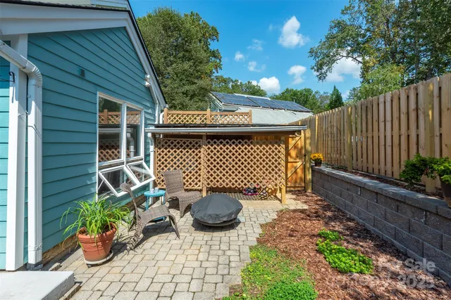 a view of a backyard with a garden