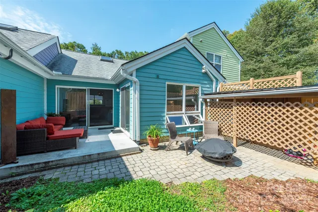 a backyard of a house with seating space