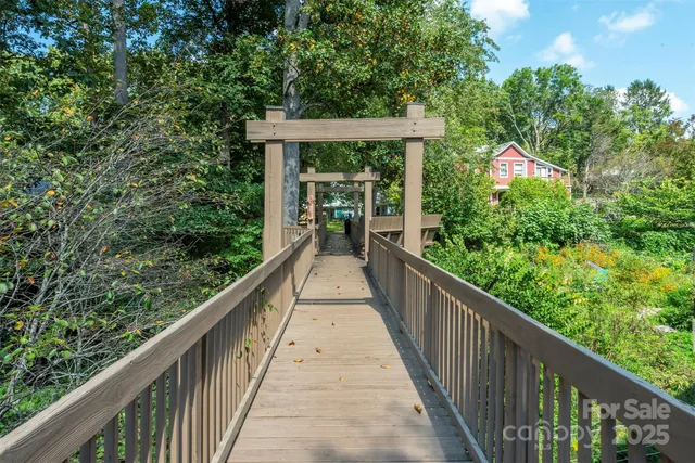a view of a wooden bridge from a balcony