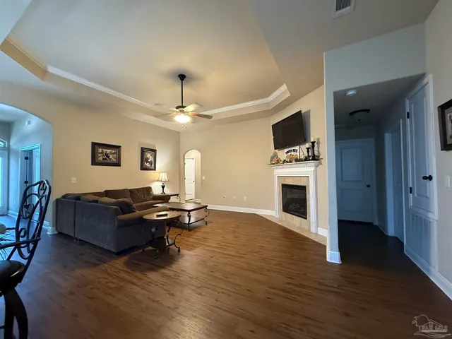 a room with fireplace and flat screen tv