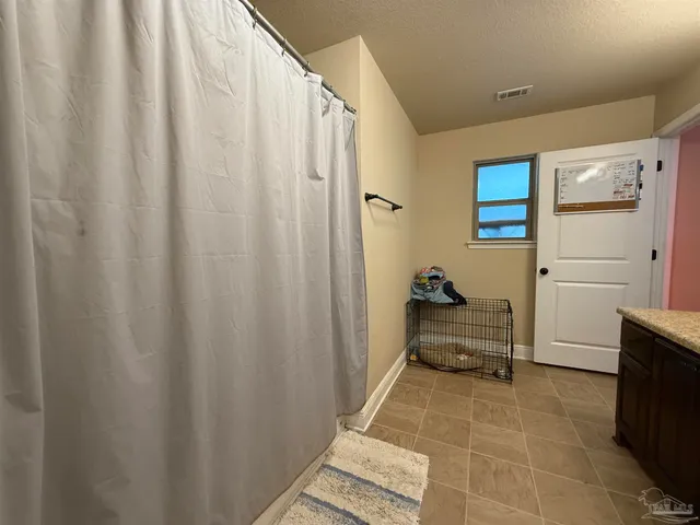 a store room with lots of clutter and other items