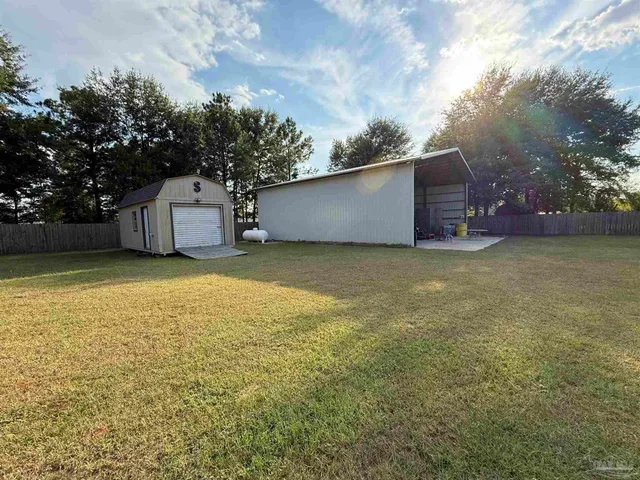 a view of sitting area in front of house