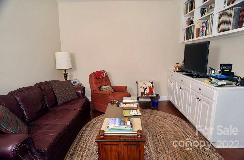 220 Sloan Road Salisbury, NC 28147 - Photo 16 of 30 a living room with furniture and a flat screen tv