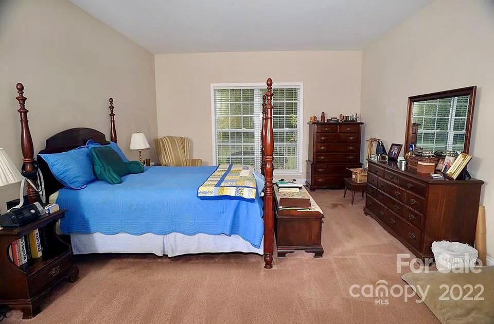 220 Sloan Road Salisbury, NC 28147 - Photo 17 of 30 a bedroom with furniture and wooden floor