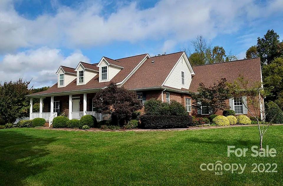 220 Sloan Road Salisbury, NC 28147 - Photo 2 of 30 a view of a house with garden and a yard