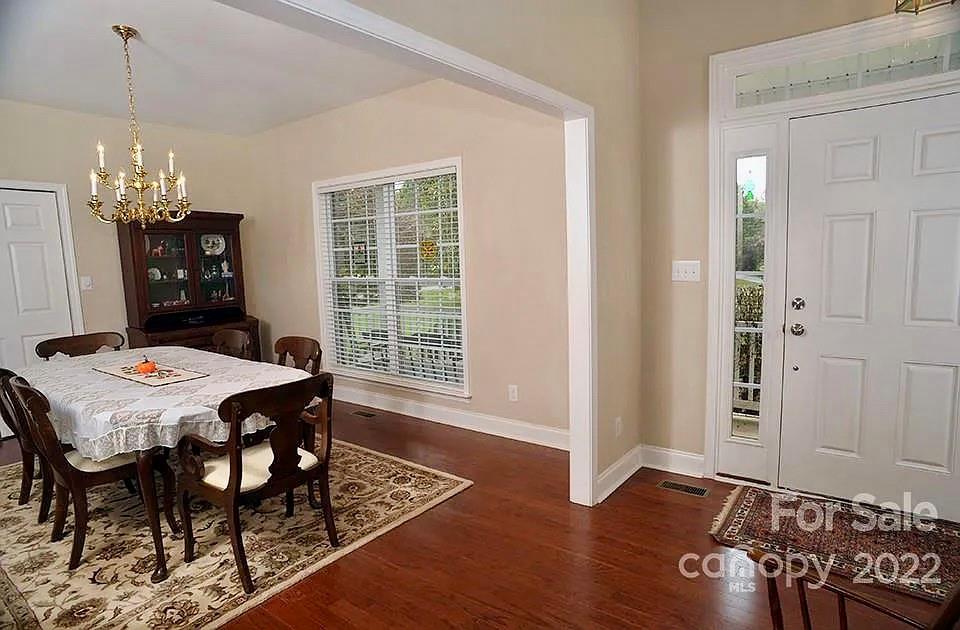 220 Sloan Road Salisbury, NC 28147 - Photo 6 of 30 a view of a dining room with furniture window and wooden floor