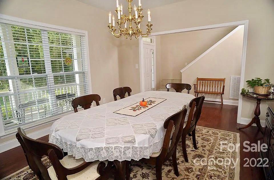 220 Sloan Road Salisbury, NC 28147 - Photo 7 of 30 a view of a dining room and hall with furniture