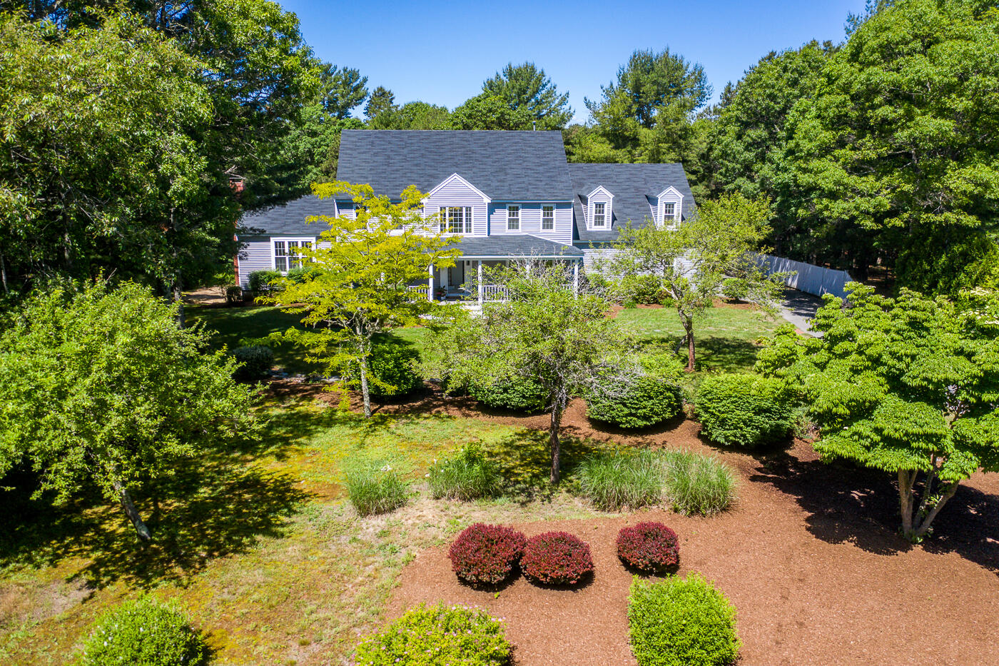 83 Whitmar Road Barnstable, MA 02635 - Photo 2 of 27 a picture of plants and large trees