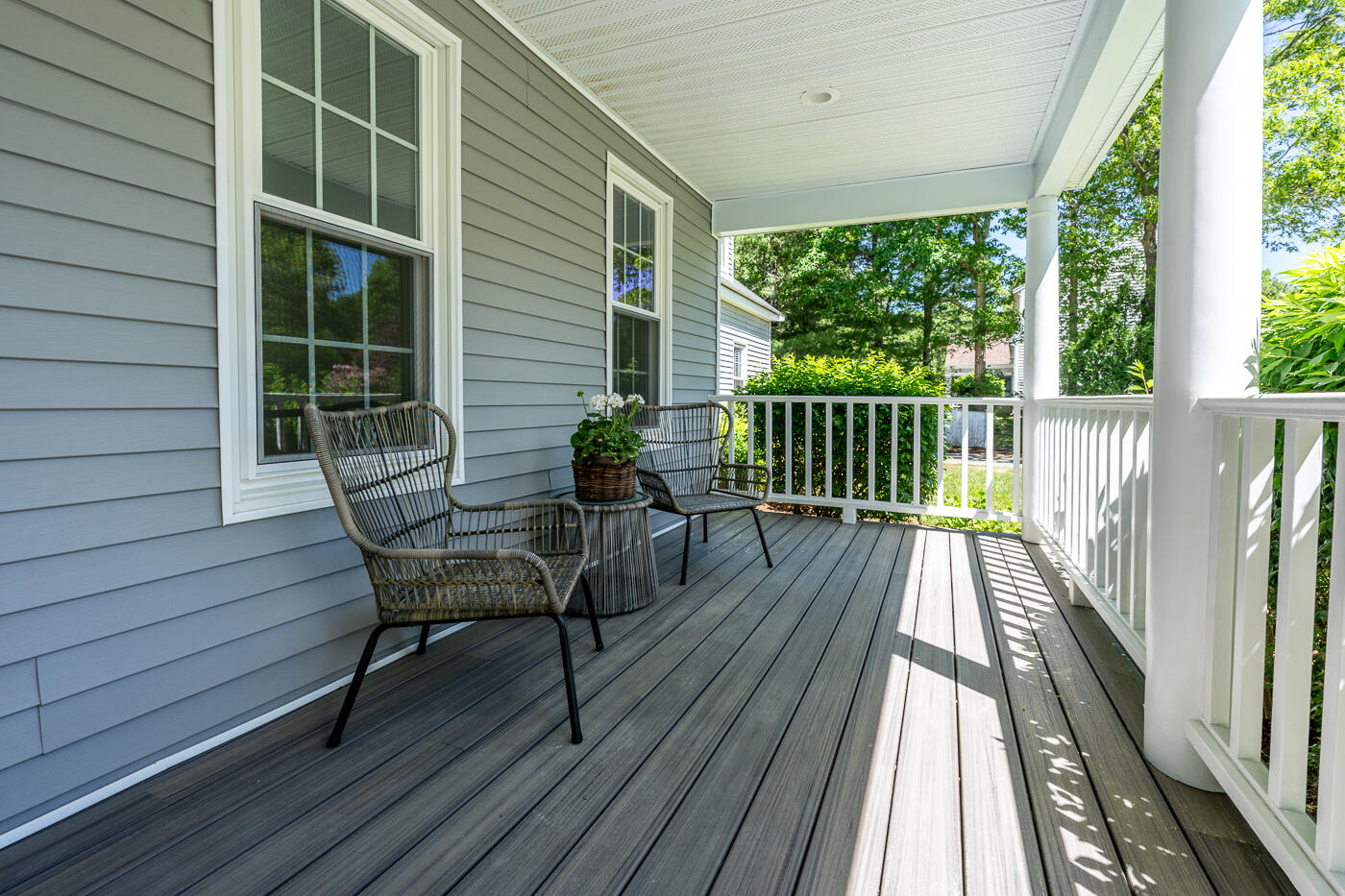 83 Whitmar Road Barnstable, MA 02635 - Photo 5 of 27 a balcony with wooden floor table and chairs